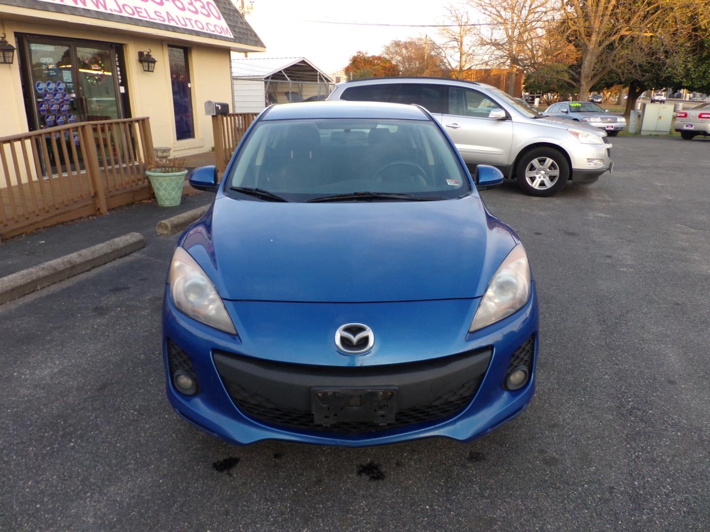 2012 Blue Mazda MAZDA3 (JM1BL1V7XC1) , located at 5700 Curlew Drive, Norfolk, VA, 23502, (757) 455-6330, 36.841885, -76.209412 - Photo#2